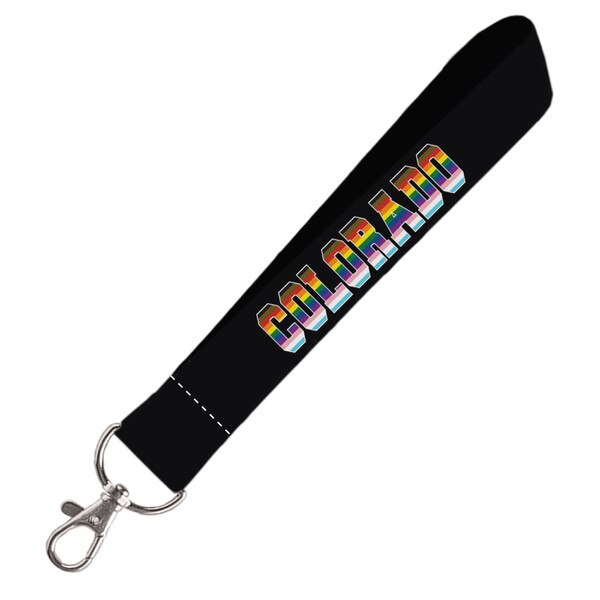 Black keychain wristlet with rainbow-striped "COLORADO" text and metal clasp